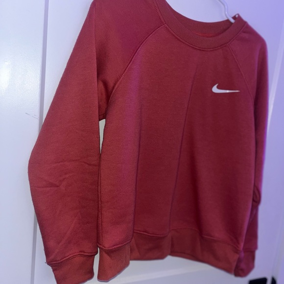 Coral color med unisex crewneck polyester sweater with a swoosh check mark on it - Picture 7 of 7